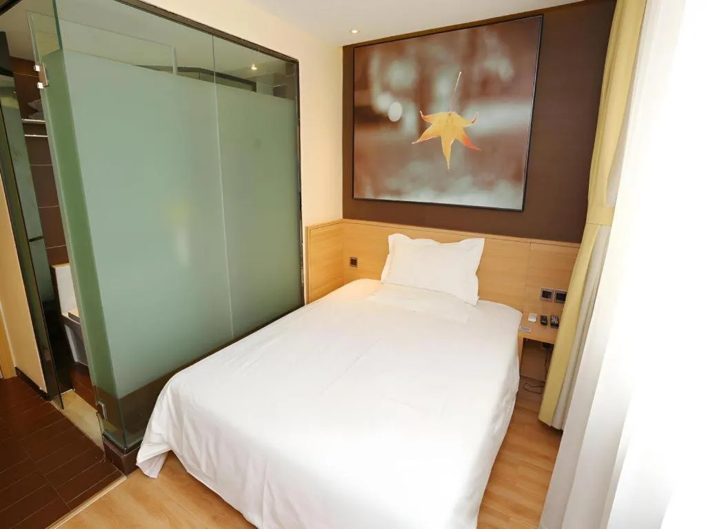 Bed in IU Hotel Tianjin Xiqing Zhong Bei Zhen Branch