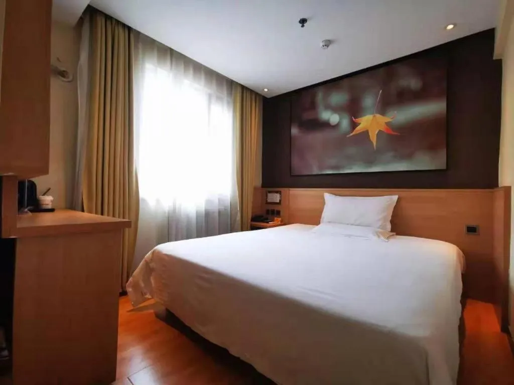 Bed in IU Hotel Tianjin Xiqing Zhong Bei Zhen Branch