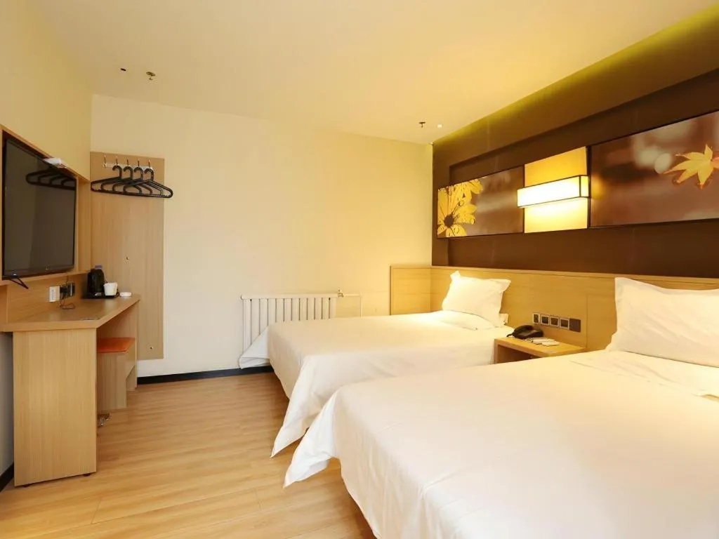 Bed in IU Hotel Tianjin Xiqing Zhong Bei Zhen Branch
