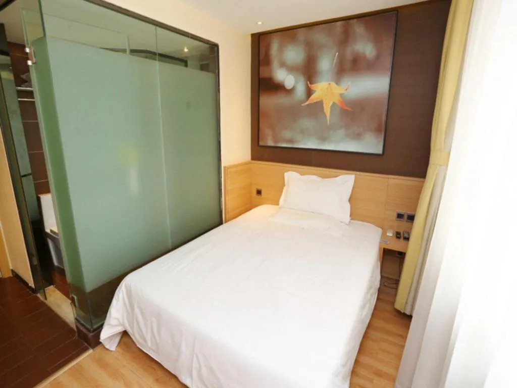Bed in IU Hotel Tianjin Xiqing Zhong Bei Zhen Branch