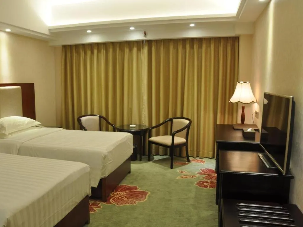 Bed in Gui Feng Hotel