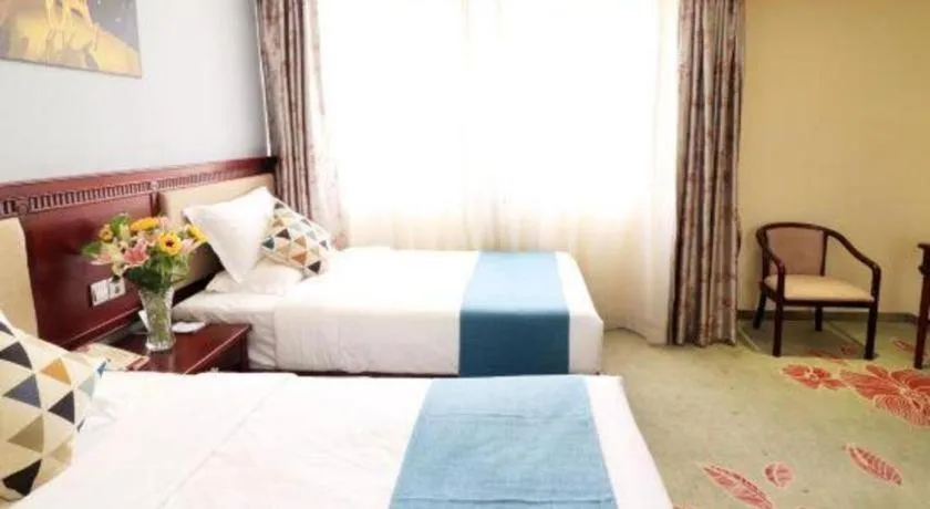 Bed in Gui Feng Hotel