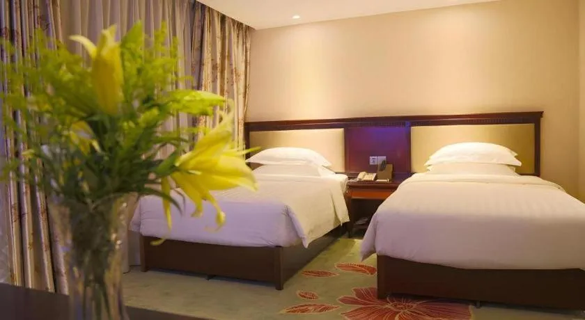 Bed in Gui Feng Hotel