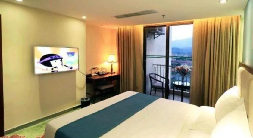 Bed in Gui Feng Hotel