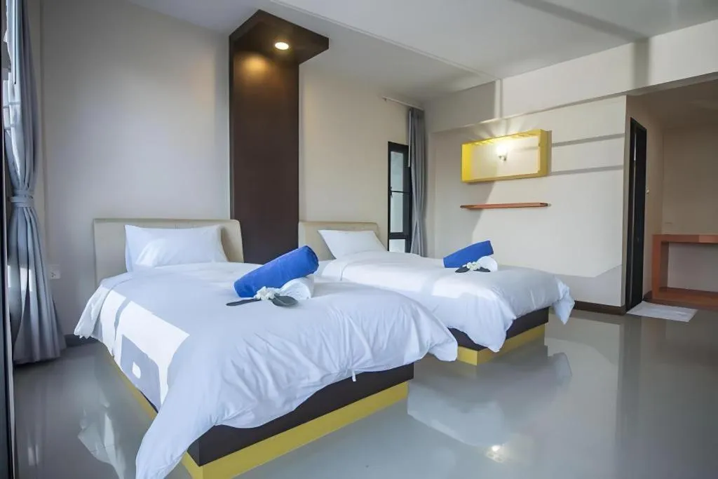 Bed in Phuphayot Resort