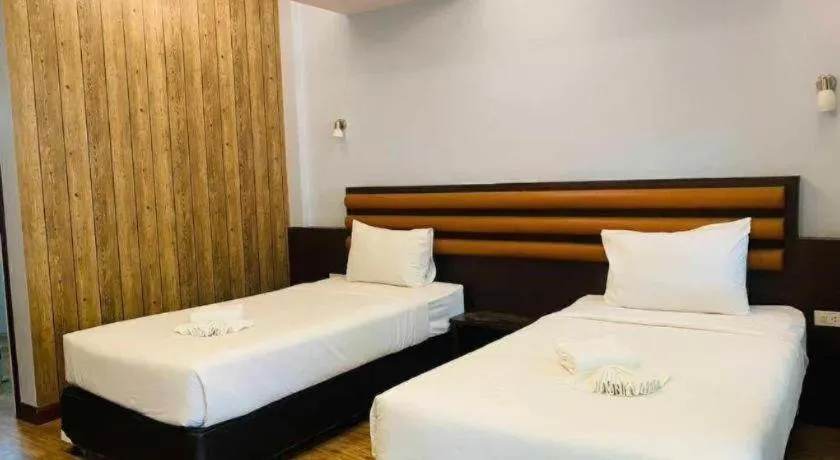 Bed in Phuphayot Resort