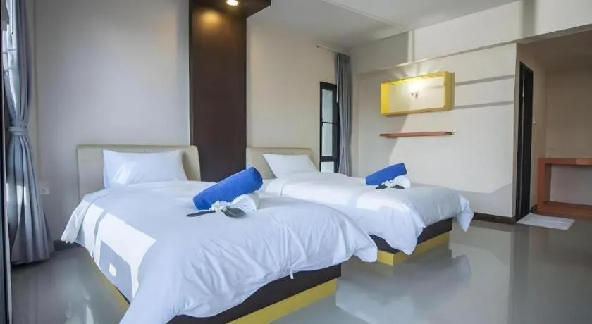 Bed in Phuphayot Resort