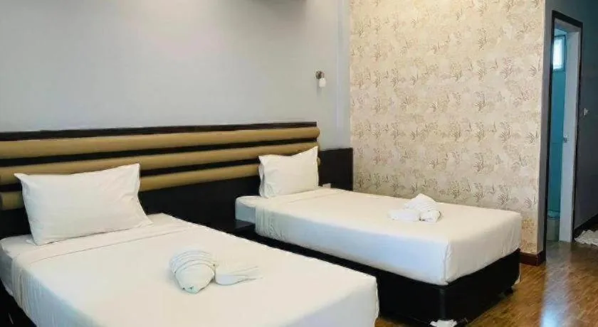 Bed in Phuphayot Resort