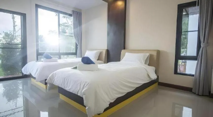 Bed in Phuphayot Resort