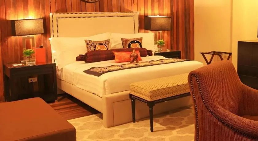 Bed in The Oriental Luxury Suites Tagaytay