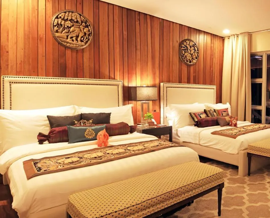 Bed in The Oriental Luxury Suites Tagaytay