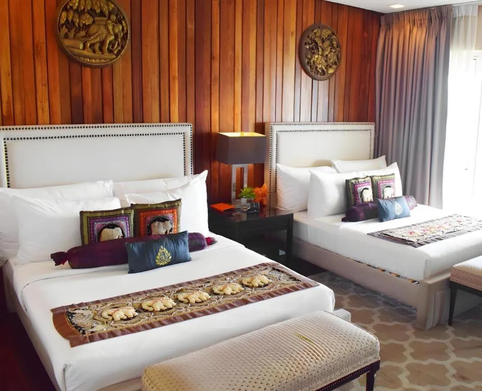 Bed in The Oriental Luxury Suites Tagaytay