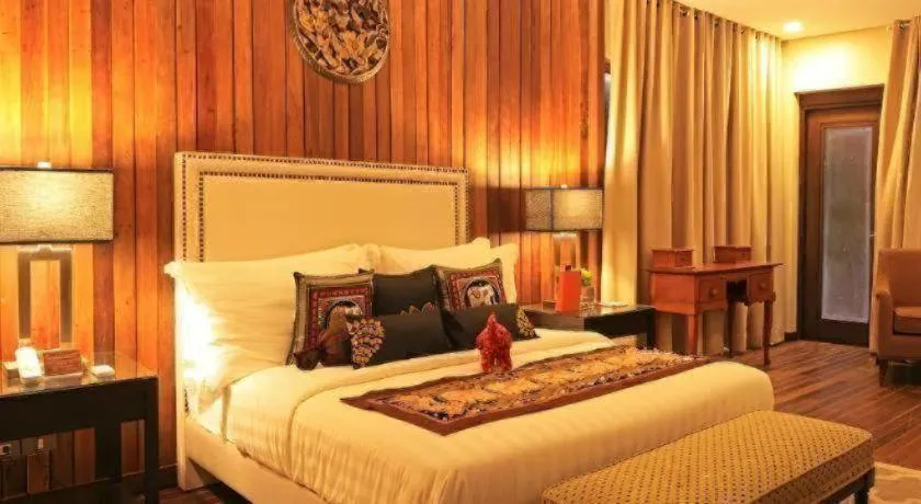 Bed in The Oriental Luxury Suites Tagaytay