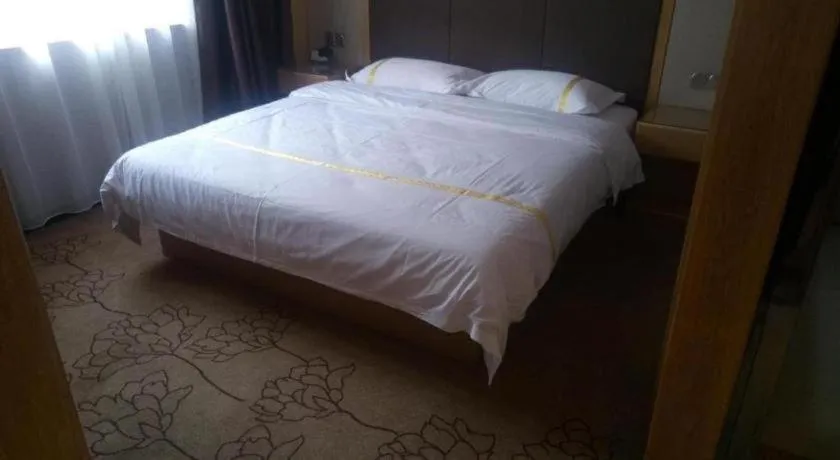 Bed in Mao Hua hotel