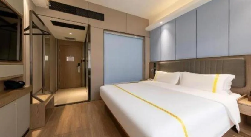 Bed in Mao Hua hotel