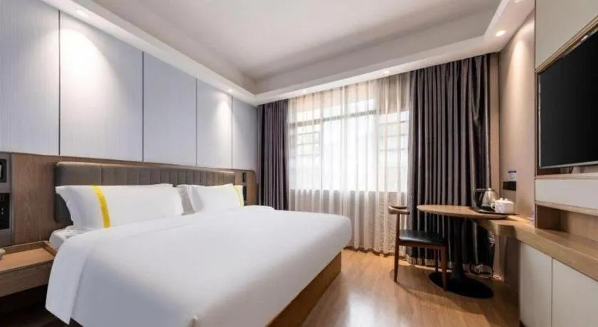 Bed in Mao Hua hotel