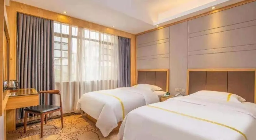Bed in Mao Hua hotel