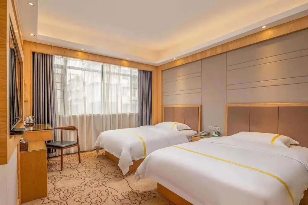 Bed in Mao Hua hotel