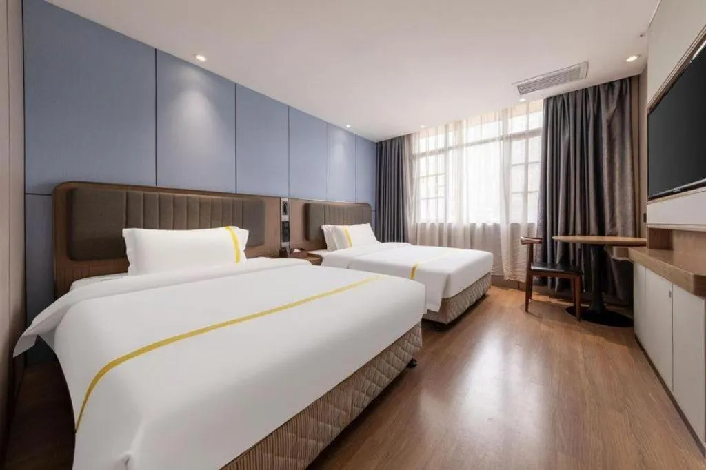 Bed in Mao Hua hotel