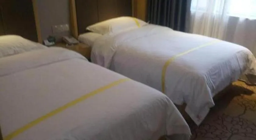 Bed in Mao Hua hotel