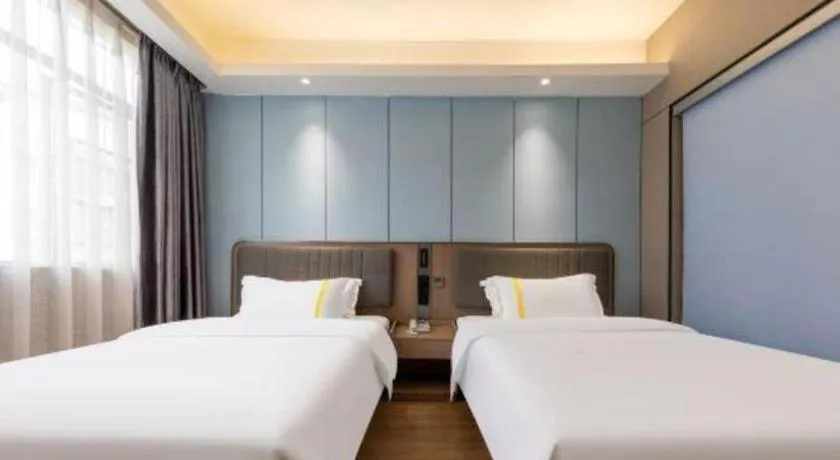 Bed in Mao Hua hotel