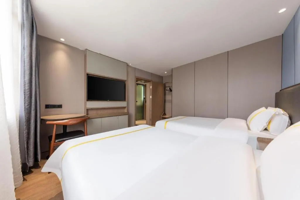 Bed in Mao Hua hotel