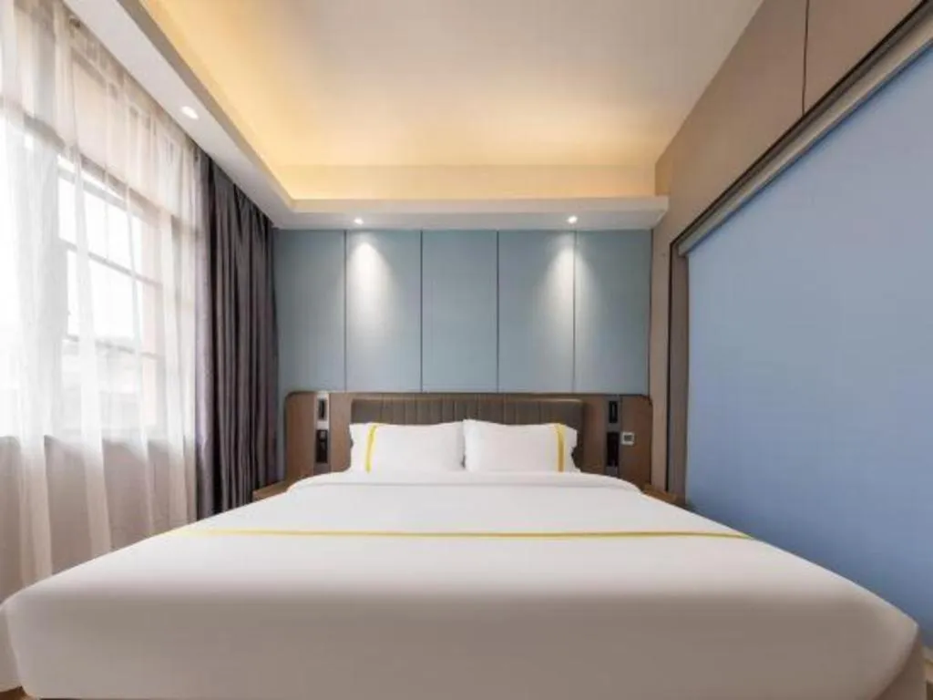 Bed in Mao Hua hotel