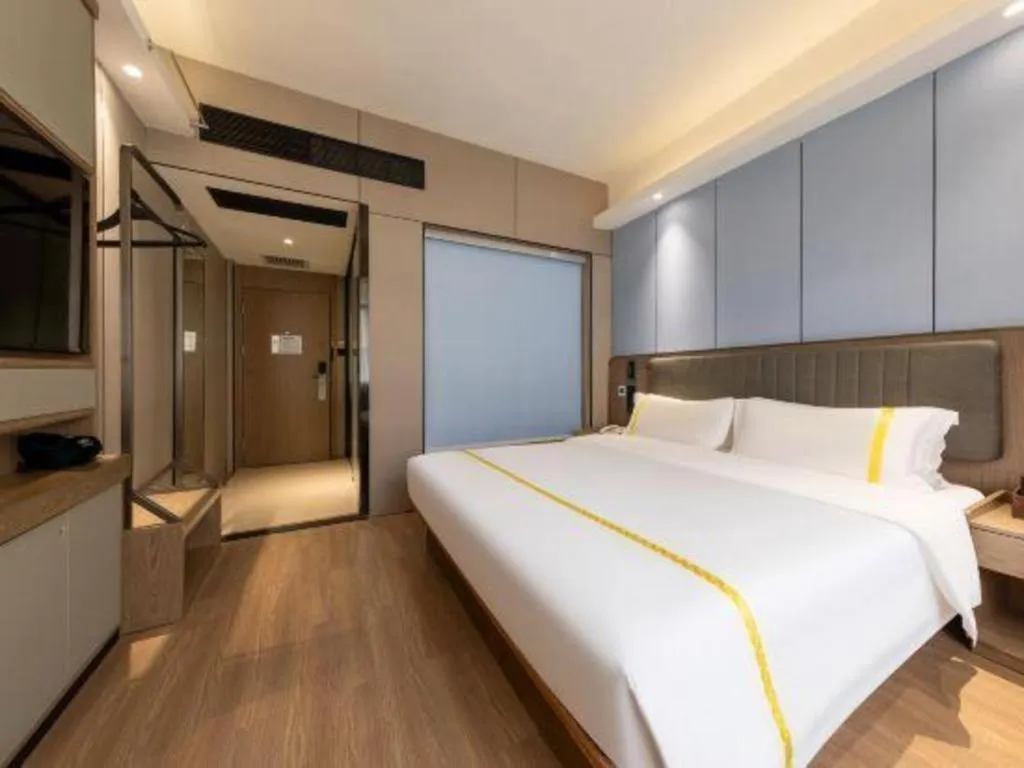 Bed in Mao Hua hotel