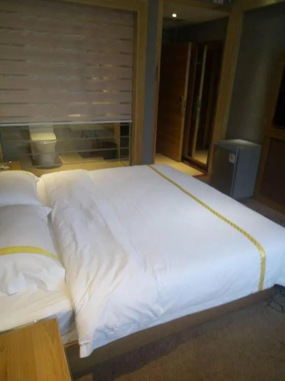 Bed in Mao Hua hotel