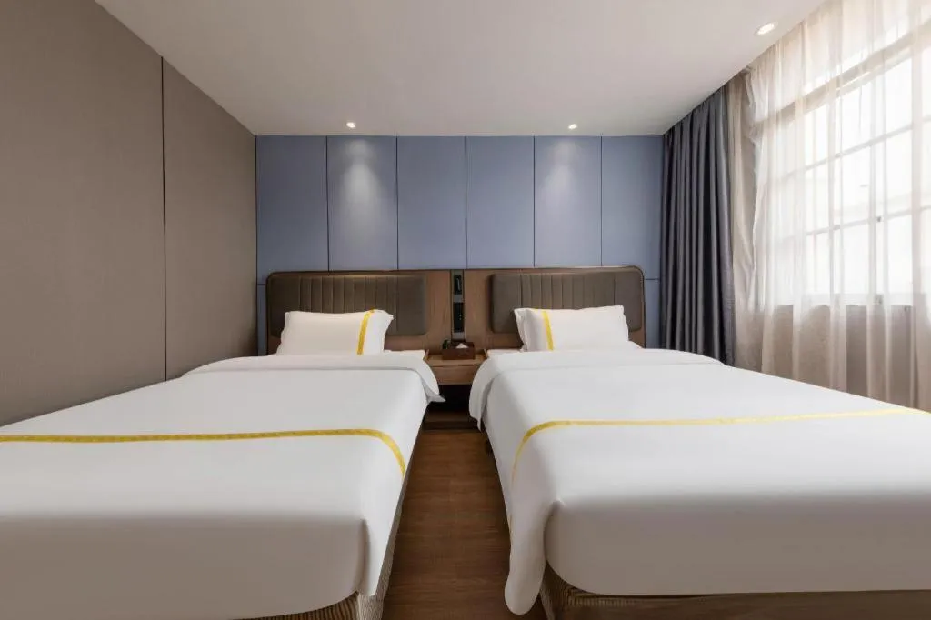 Bed in Mao Hua hotel