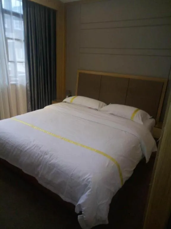 Bed in Mao Hua hotel