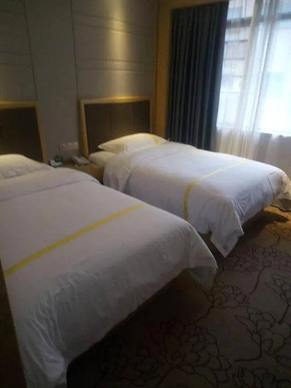 Bed in Mao Hua hotel