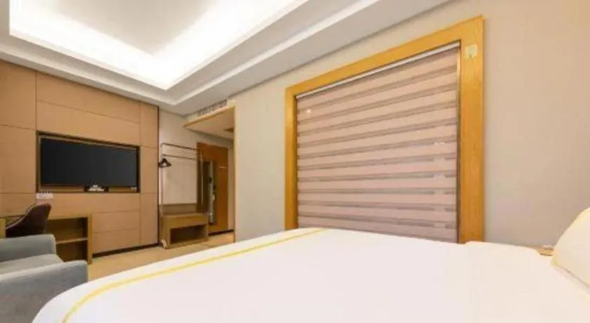 Bed in Mao Hua hotel