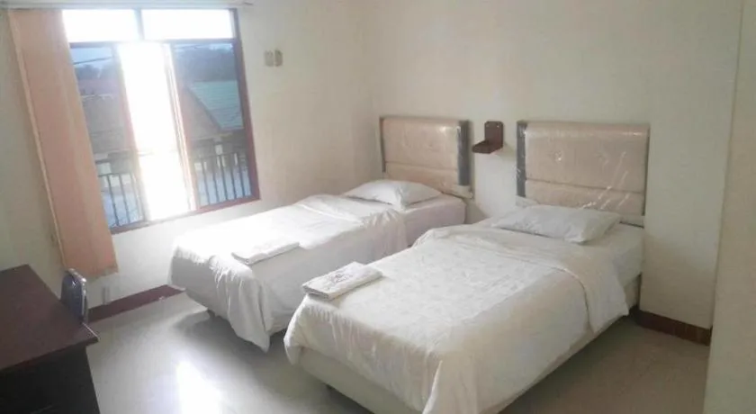 Bed in Avicenna Hotel