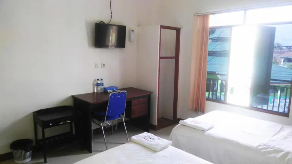 Bed in Avicenna Hotel