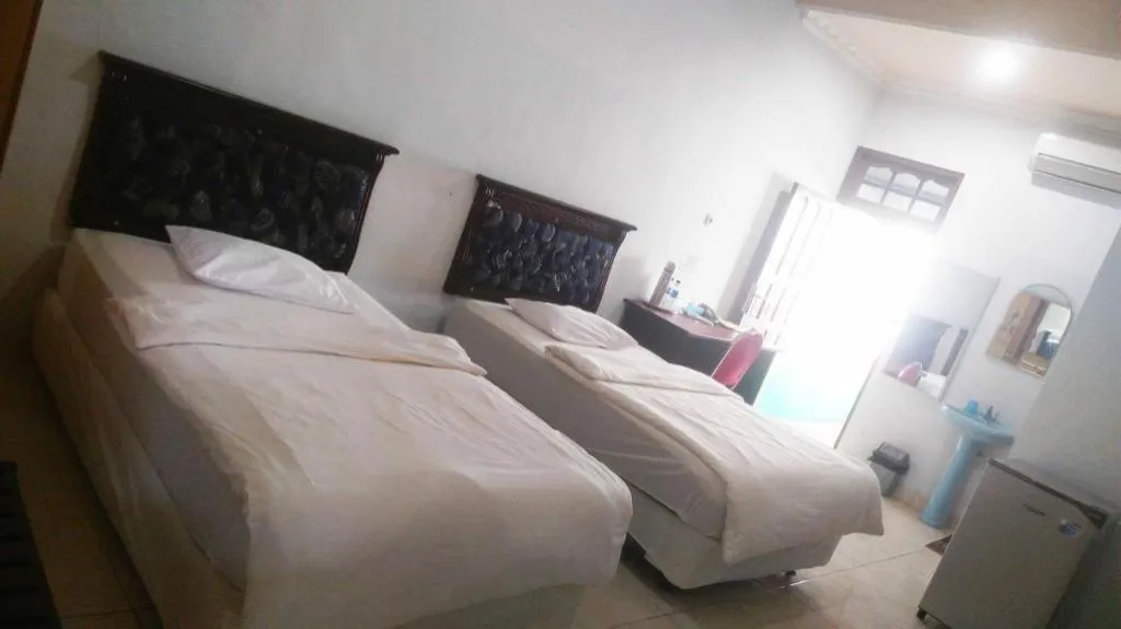 Bed in Avicenna Hotel