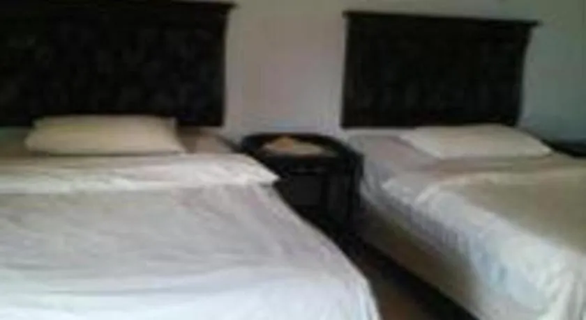 Bed in Avicenna Hotel