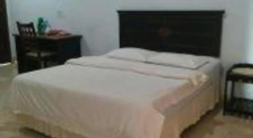 Bed in Avicenna Hotel