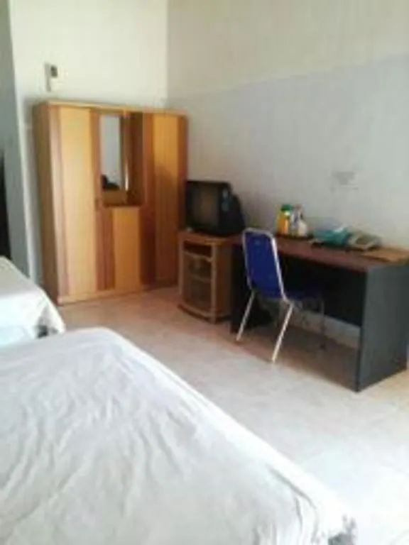 Bed in Avicenna Hotel