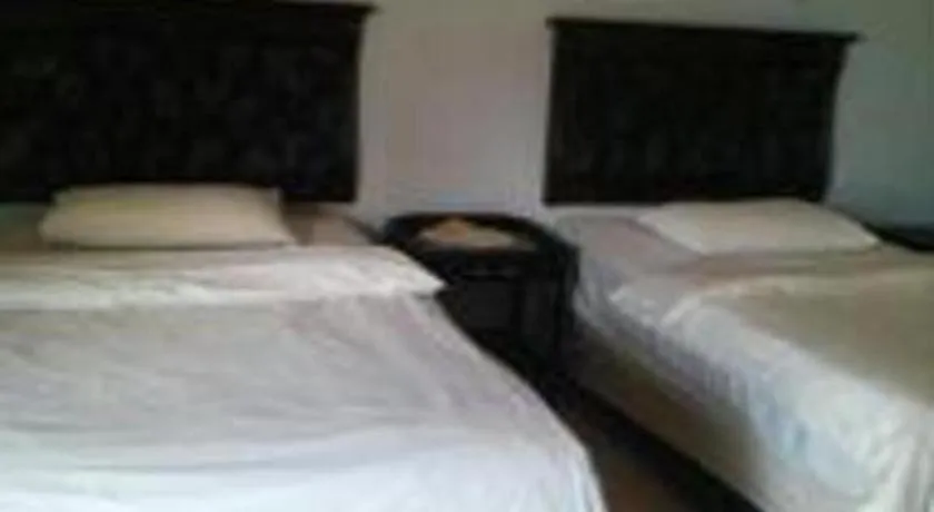 Bed in Avicenna Hotel