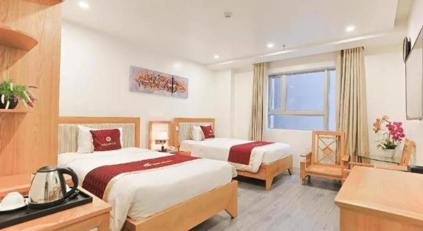 Bed in Grand Jeep Hotel Danang