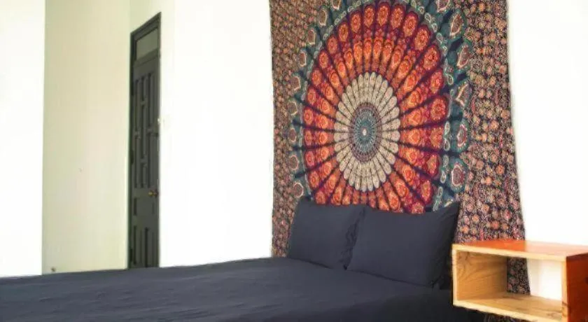 Bed in Birdnests Hotel