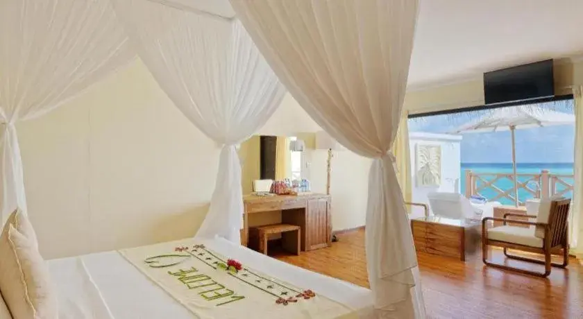 Bed in Angaga Island Resort and Spa Bed in Angaga Island Resort and Spa