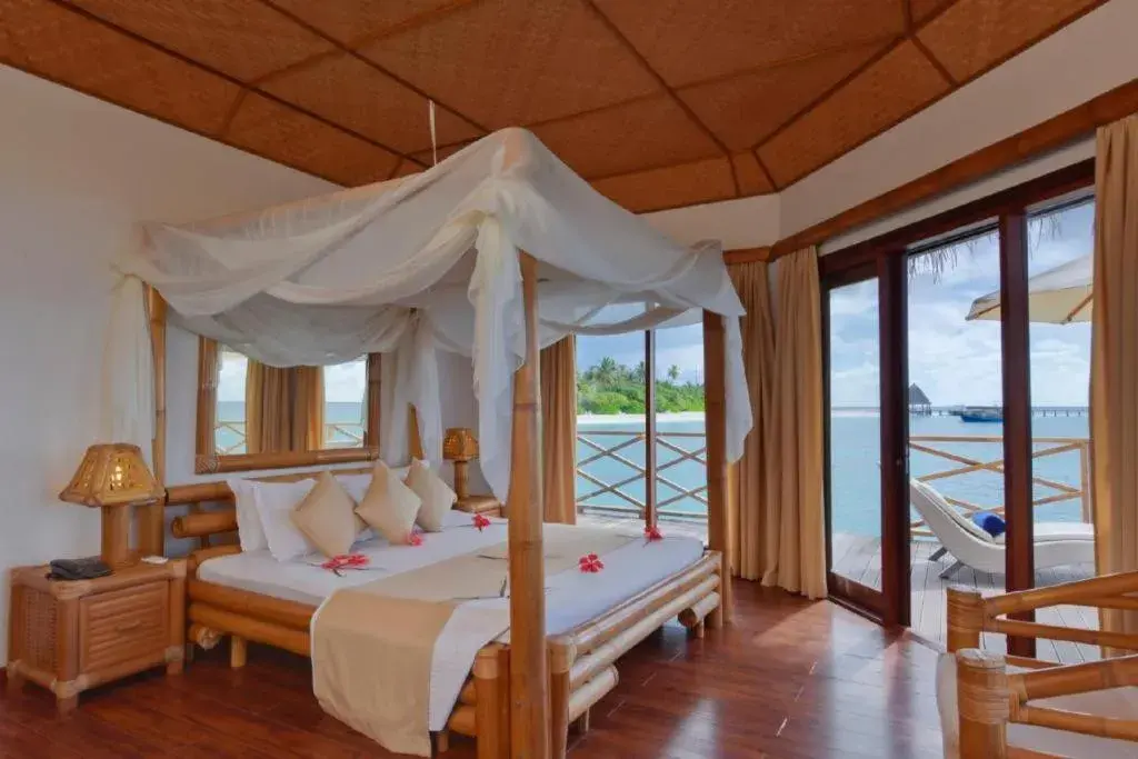 Bed in Angaga Island Resort and Spa Bed in Angaga Island Resort and Spa