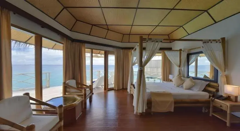 Bed in Angaga Island Resort and Spa Bed in Angaga Island Resort and Spa