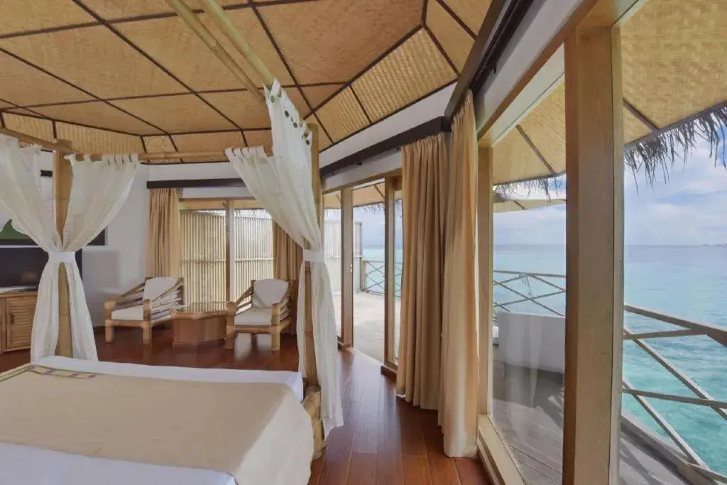 Bed in Angaga Island Resort and Spa Bed in Angaga Island Resort and Spa