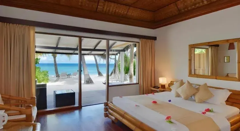 Bed in Angaga Island Resort and Spa Bed in Angaga Island Resort and Spa