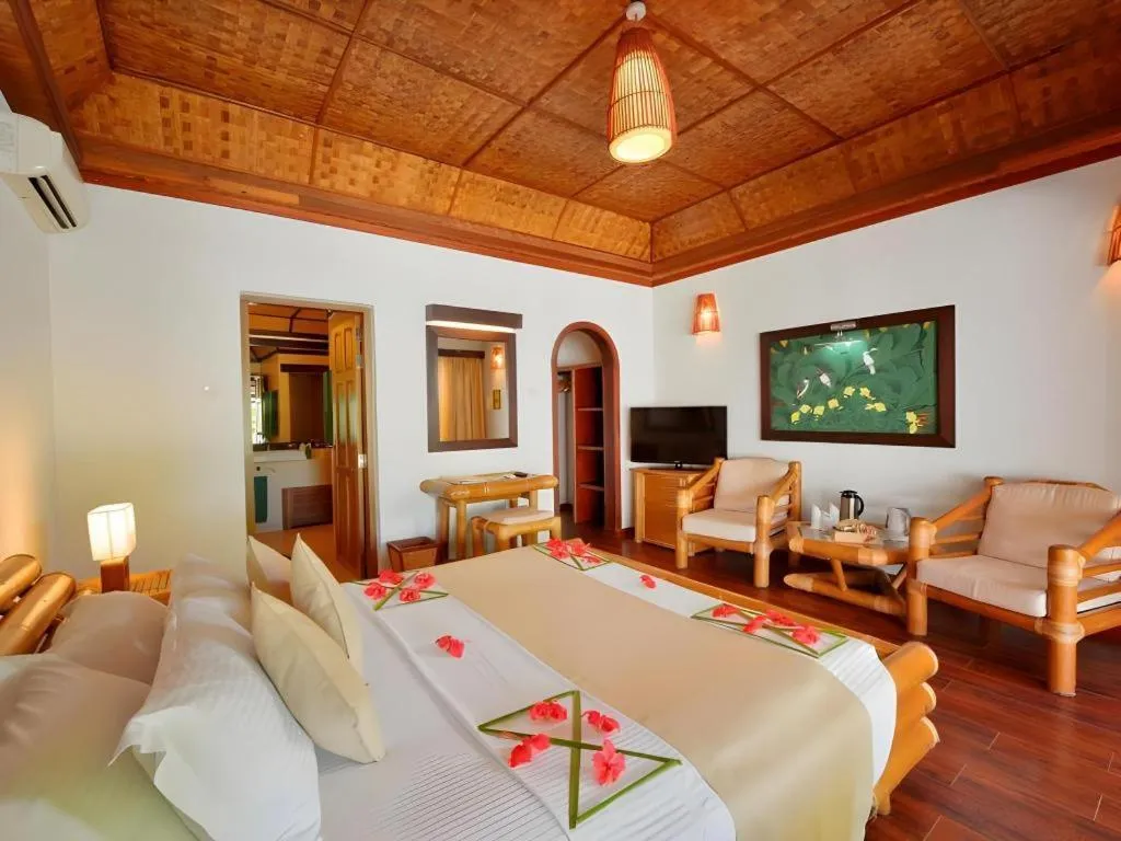 Bed in Angaga Island Resort and Spa