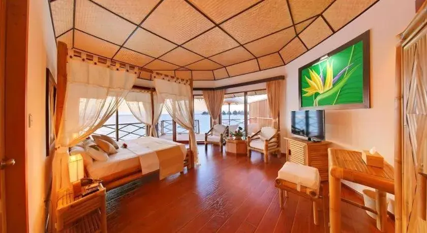 Bed in Angaga Island Resort and Spa Bed in Angaga Island Resort and Spa