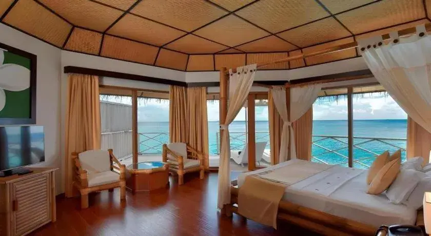 Bed in Angaga Island Resort and Spa Bed in Angaga Island Resort and Spa